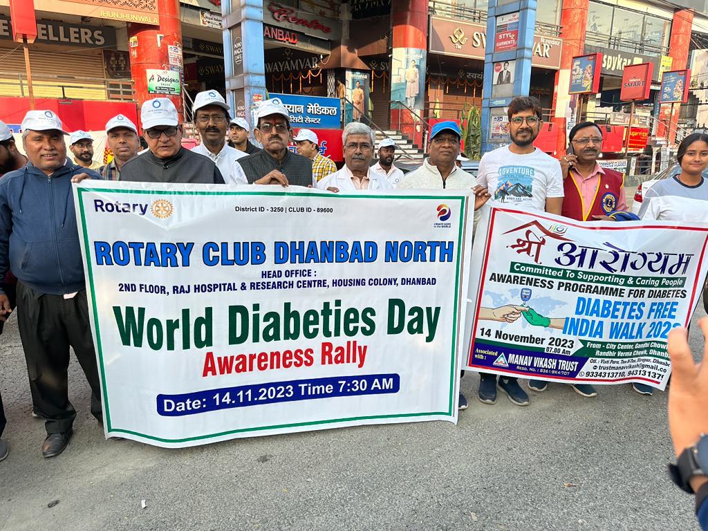 A photograph capturing a moment of community service and trust engagement.