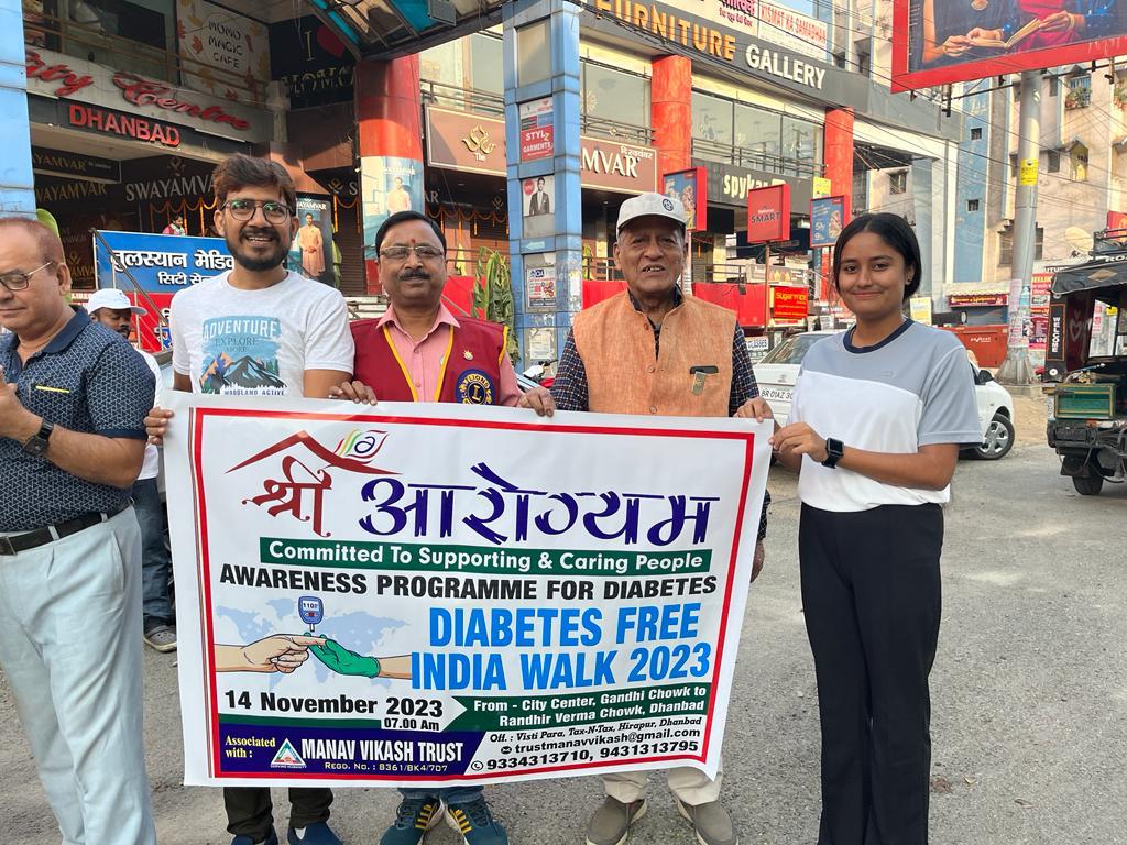 A photograph capturing a moment of community service and trust engagement.